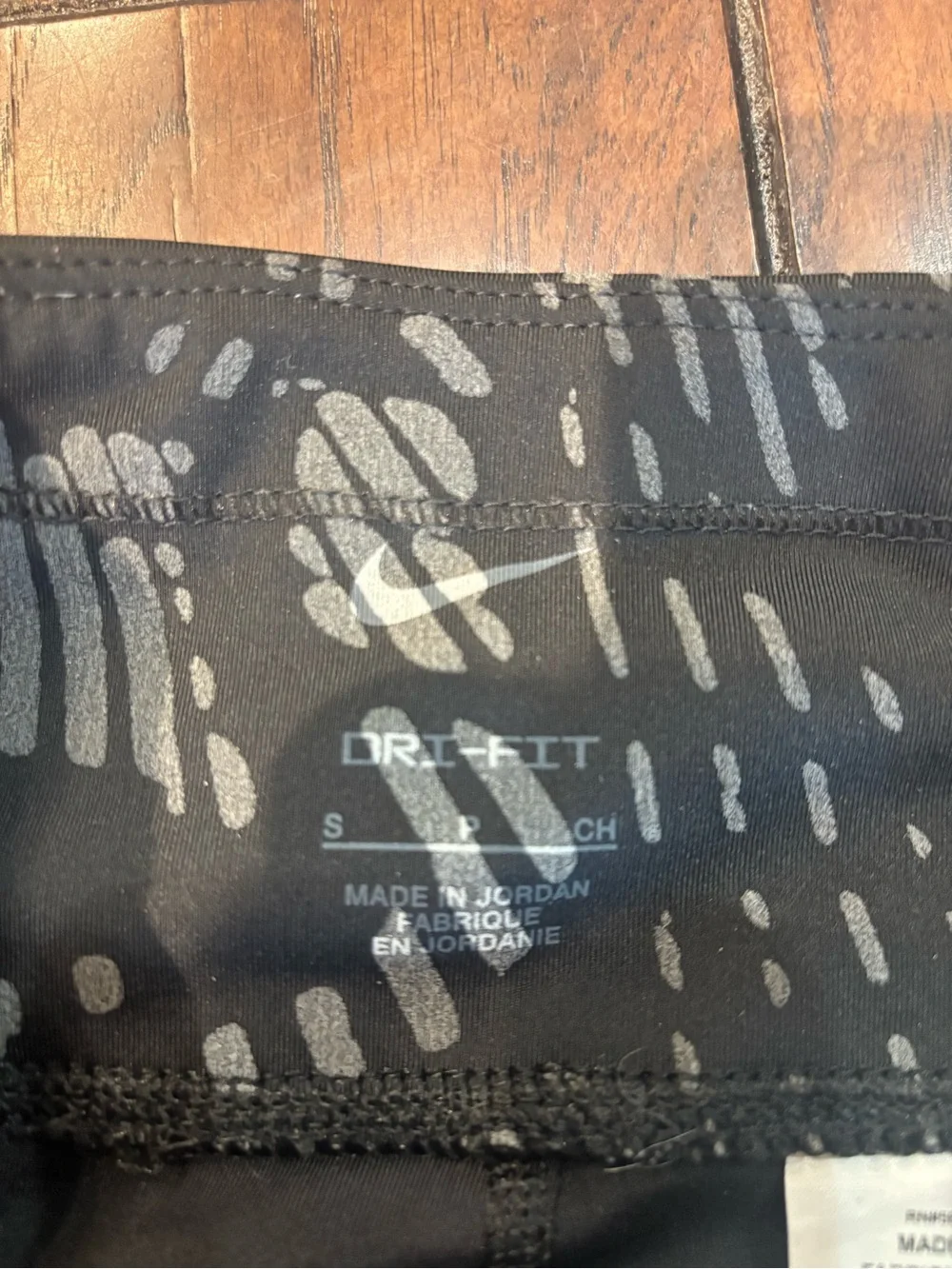 Woman’s Nike size small REFELECTIVE full length running pants. ONLY worn once